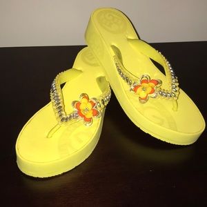 BCBG yellow flip flops